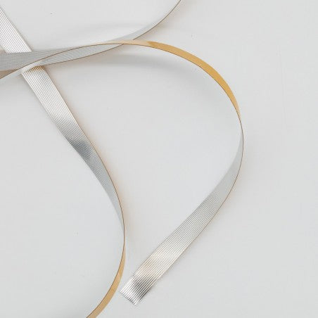 Strisce adesive per finiture decorative