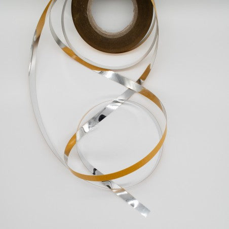 Strisce adesive per finiture decorative